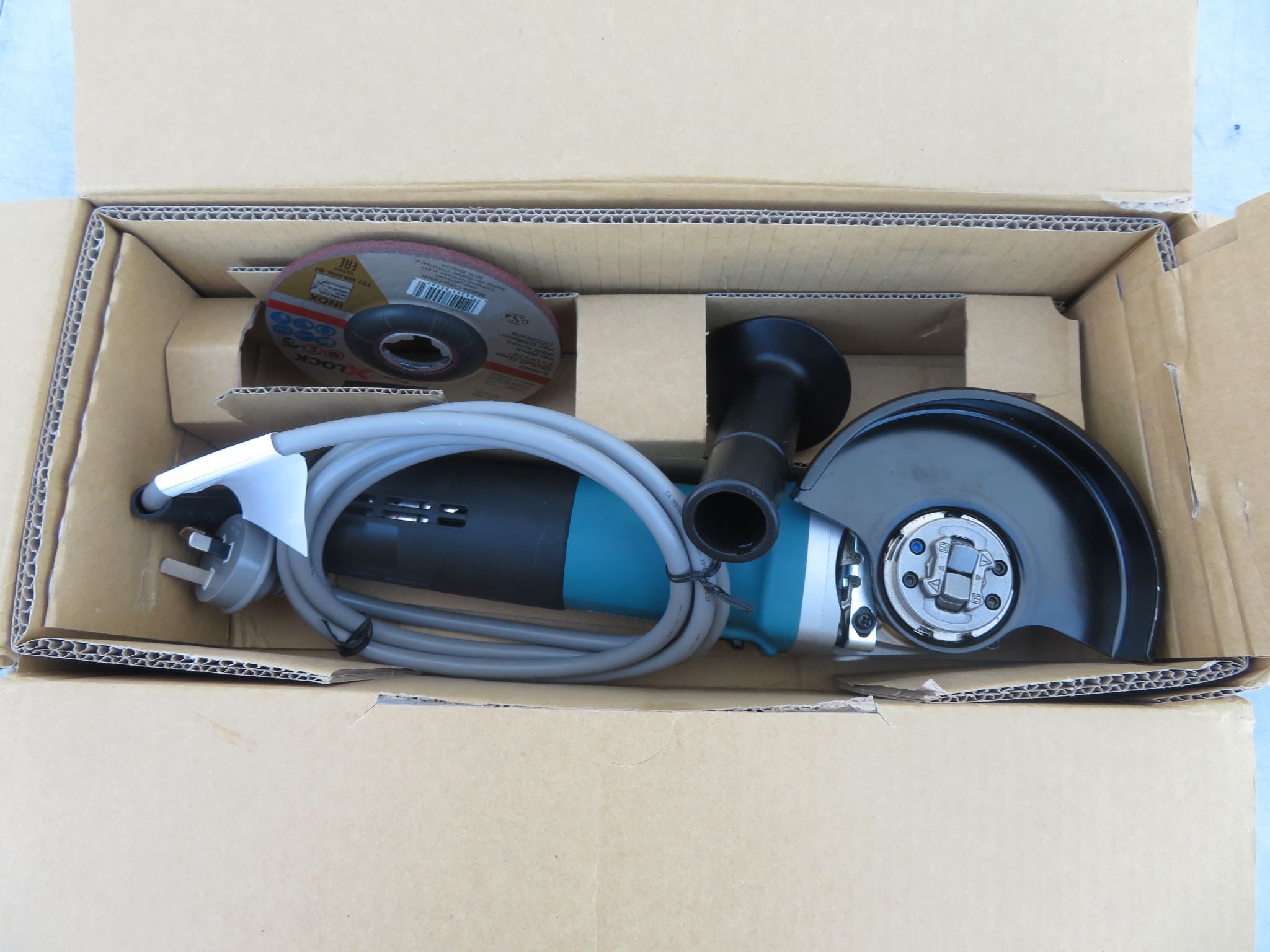Makita 5in Angle Grinder with X-Lock Thumb Switch with Lock-On