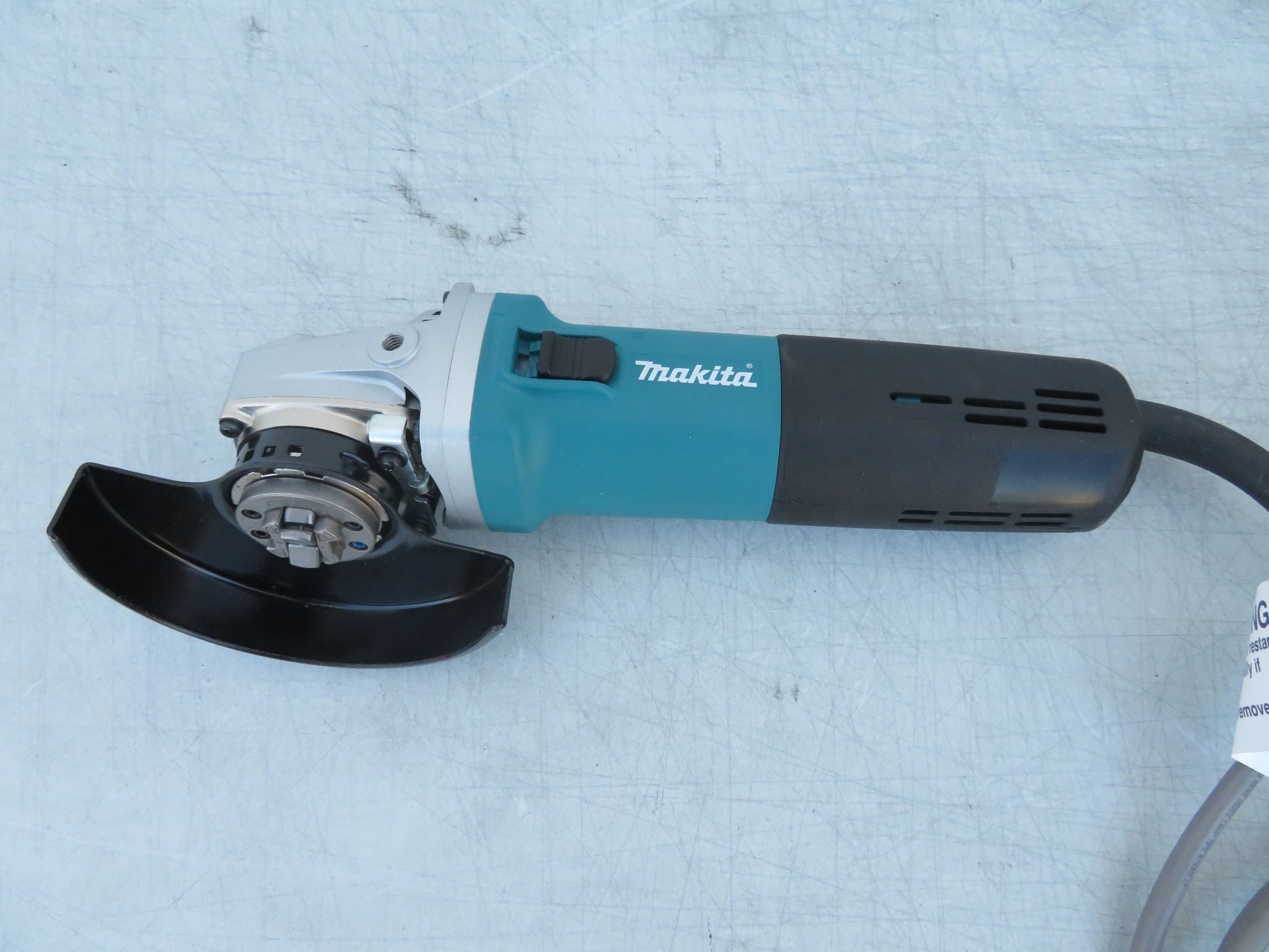 Makita 5in Angle Grinder with X-Lock Thumb Switch with Lock-On