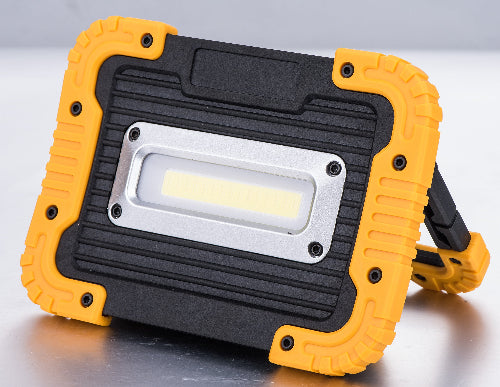 A compact black and yellow LED rechargeable work light with power bank features.